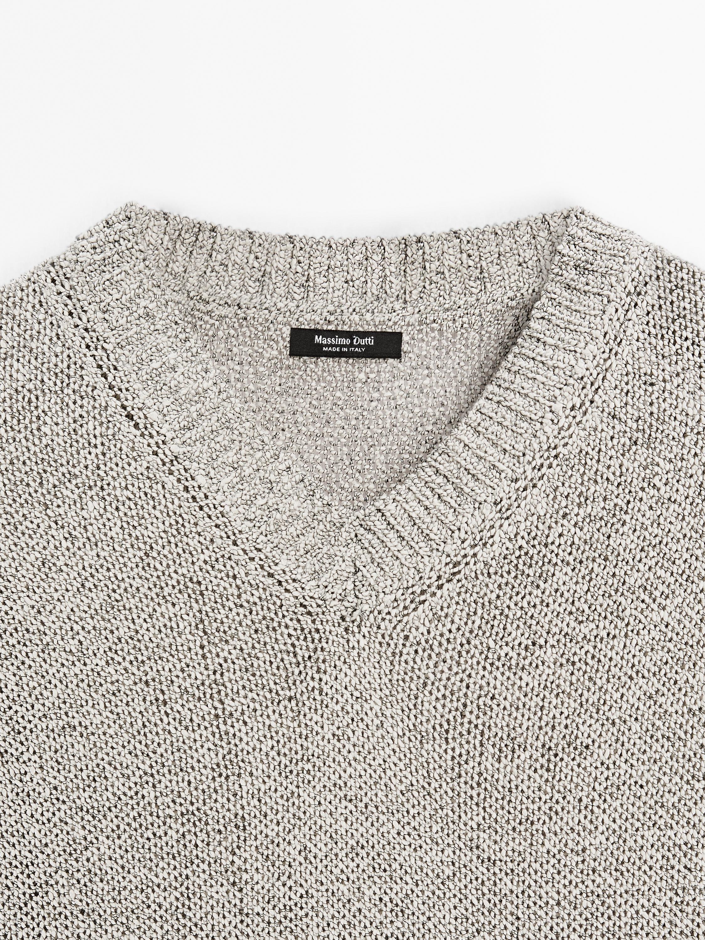 Knit sweater with fabric detail